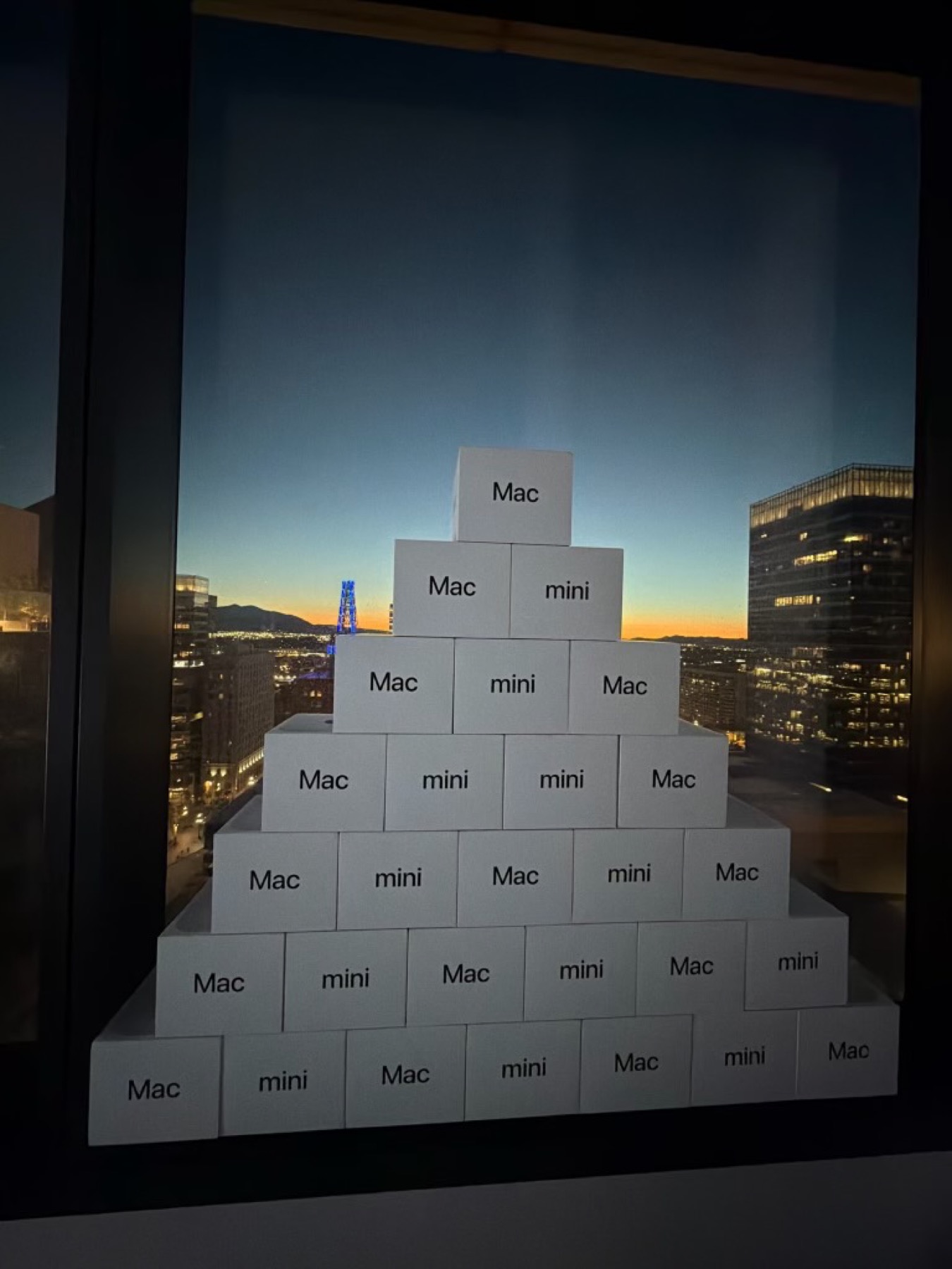 Mac Mini computers stacked — one per founding member